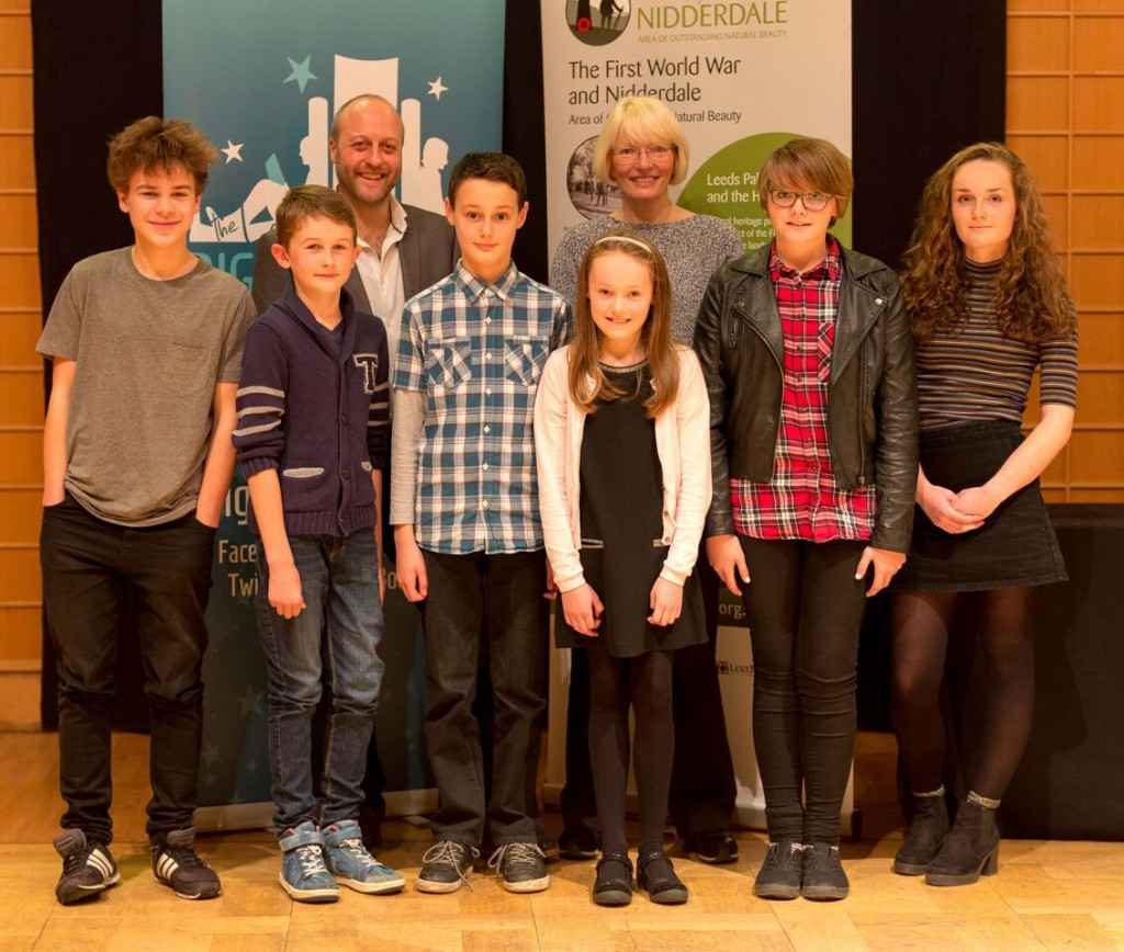 The winners of our children's WW1 writing competition 2015. From left to right: Elisei Ulrich-Oltean, Theo Burkhill-Howarth, Daniel Ingram-Brown (judge), Benjamin Searle, Susan Burnett (judge), Evie May Richards, Emma Madden, Sacha Rines. Photo: Steve Evans