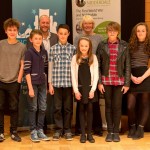 The winners of our children's WW1 writing competition 2015. From left to right: Elisei Ulrich-Oltean, Theo Burkhill-Howarth, Daniel Ingram-Brown (judge), Benjamin Searle, Susan Burnett (judge), Evie May Richards, Emma Madden, Sacha Rines. Photo: Steve Evans